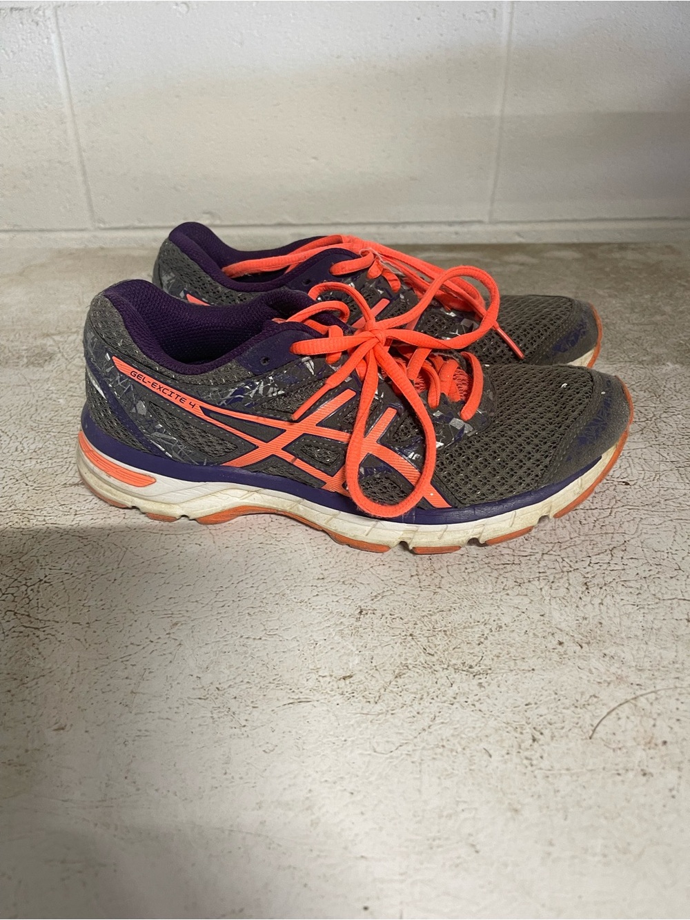 ASICS Gray Athletic Shoes with Bright Orange Accents